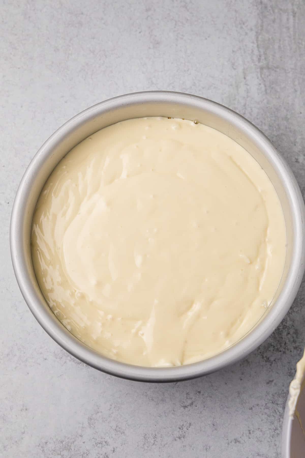 cheesecake batter in prepared pan