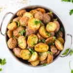 roasted red potatoes in a bowl sprinkled with parsley