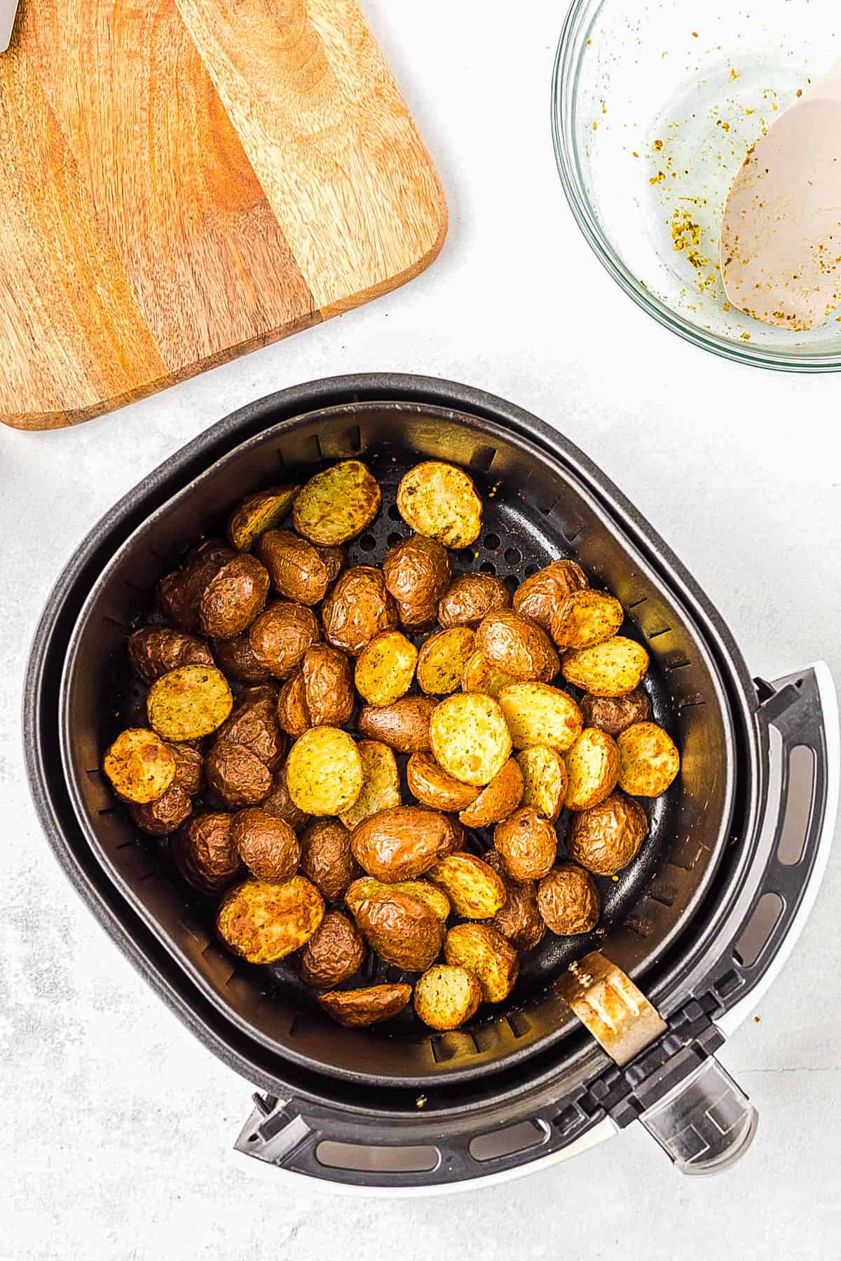 cooked potatoes in air fryer basket