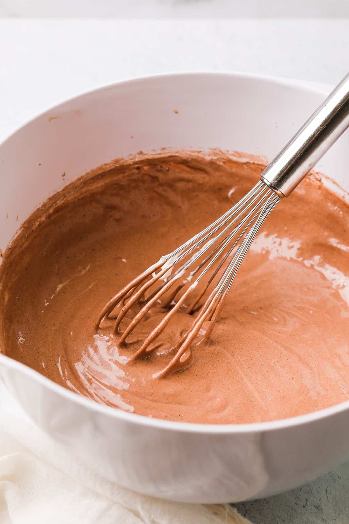 mixing together cool whip and pudding