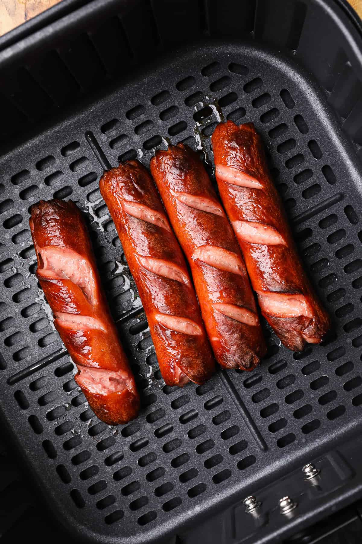 cooked hot dogs in air fryer basket