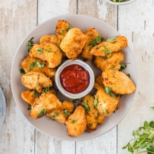 a plate of chicken nuggets