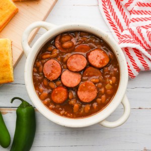 baked beans mixed with sliced sausage