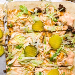 Big mac pizza recipe with slices on a sheet pan.