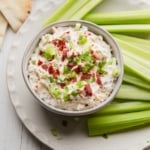 Beef jerky dip in a bowl with celery.