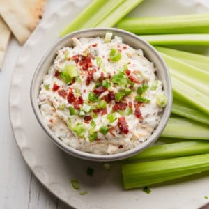 Beef jerky dip in a bowl with celery.