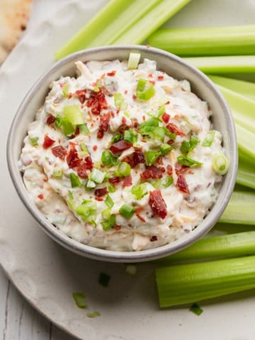 beef jerky dip in a bowl with celery