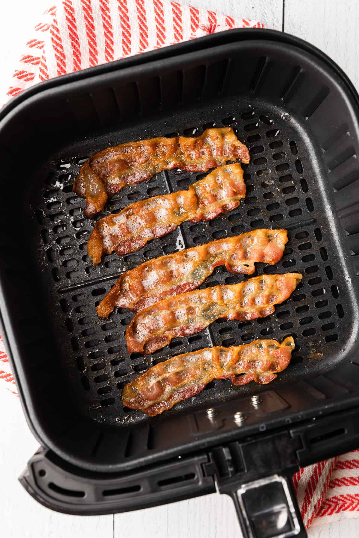 cooked bacon in the air fryer basket