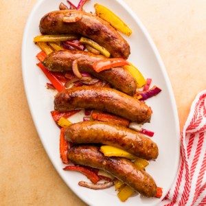 air fryer sausage and peppers completed and served on a platter