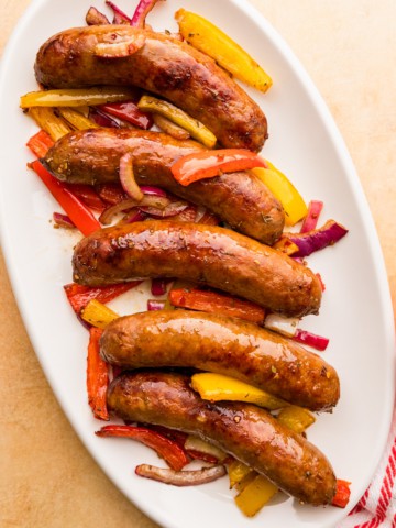 air fryer sausage and peppers completed and served on a platter