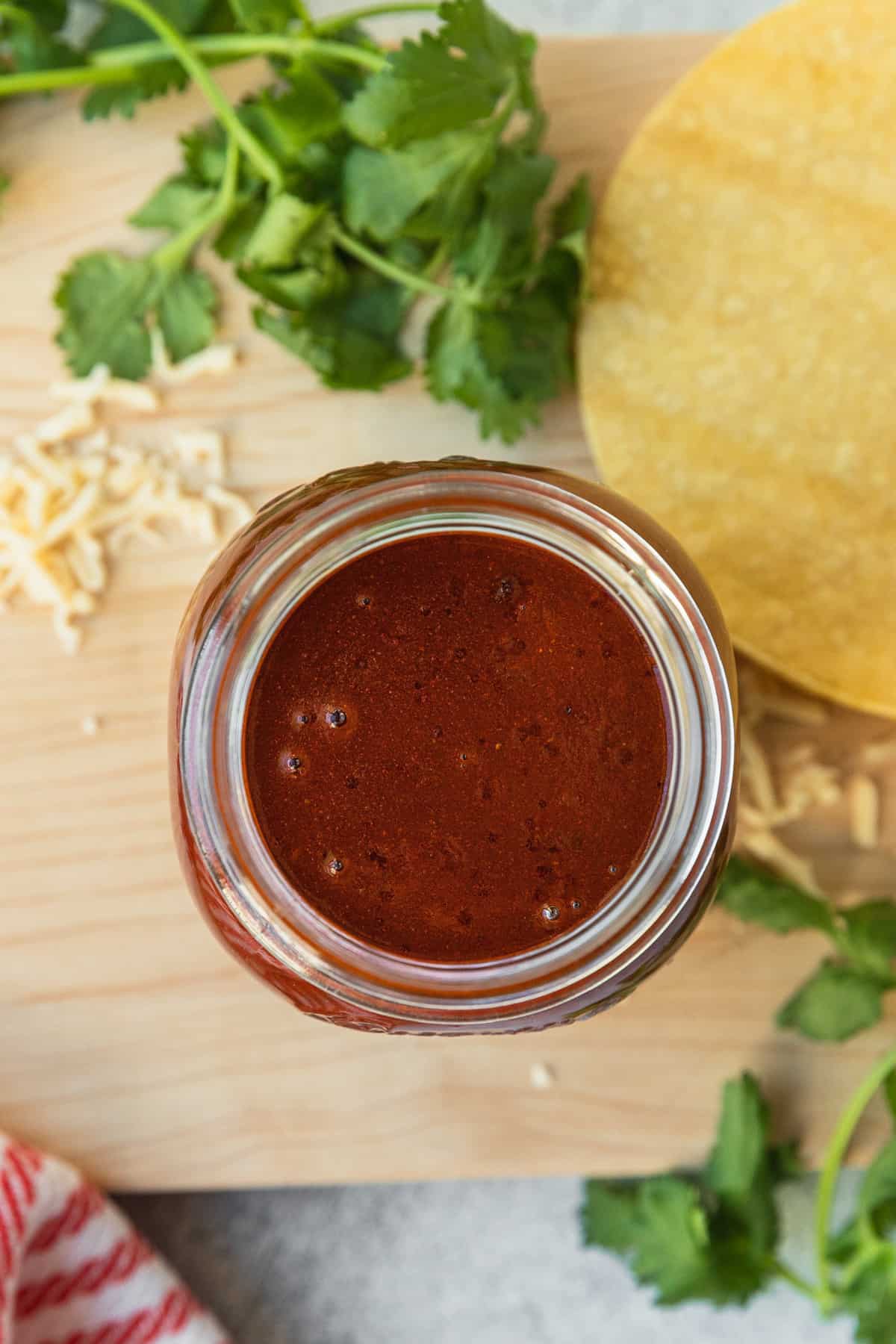 an open jar of enchilada sauce