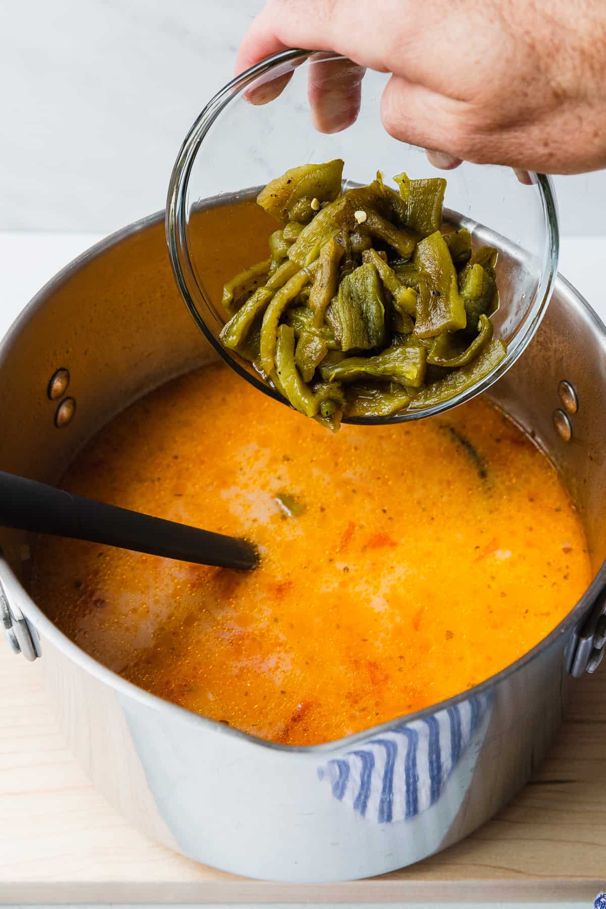 adding roasted green chile to soup