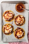 making huevos rancheros with red chile sauce