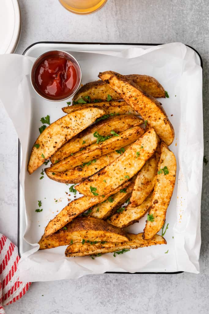 a serving of steak fries on a tray