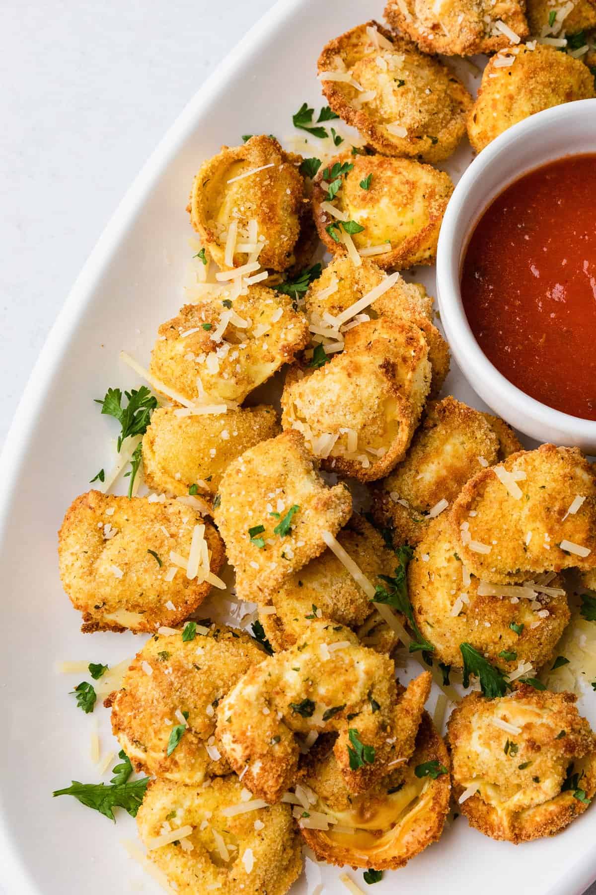 a platter of crispy air fried tortellini pasta pieces