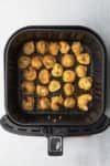 complete crispy air fryer tortellini in the air fryer basket