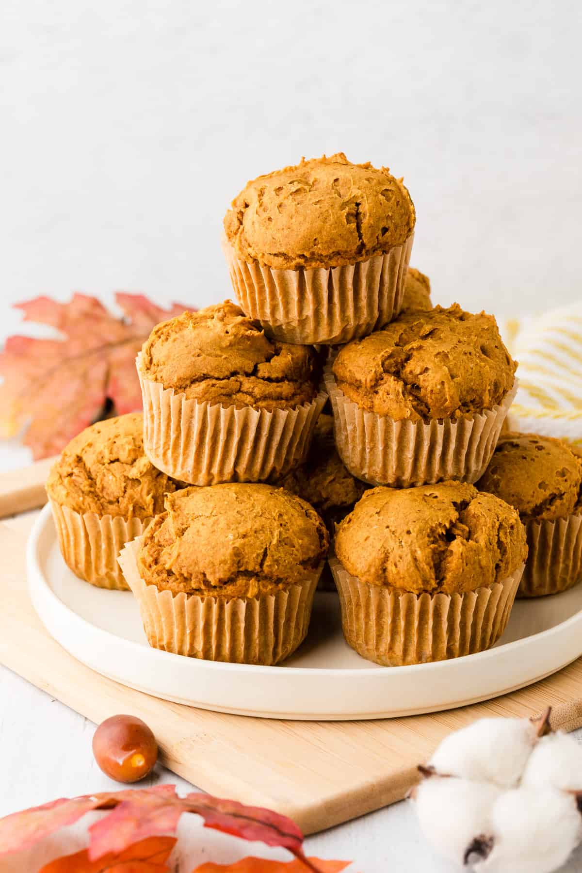 a pile of pumpkin muffins on a plate