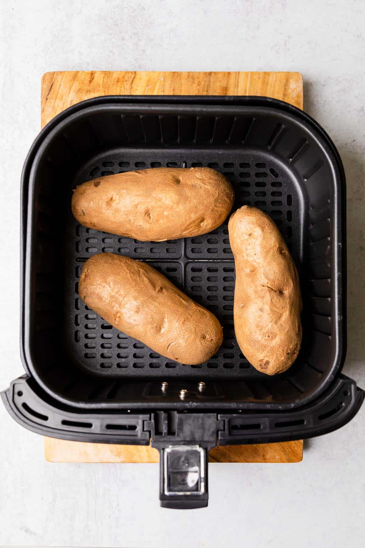 making the recipe with potatoes in the air fryer