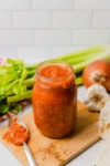 a jar of red tomato sauce