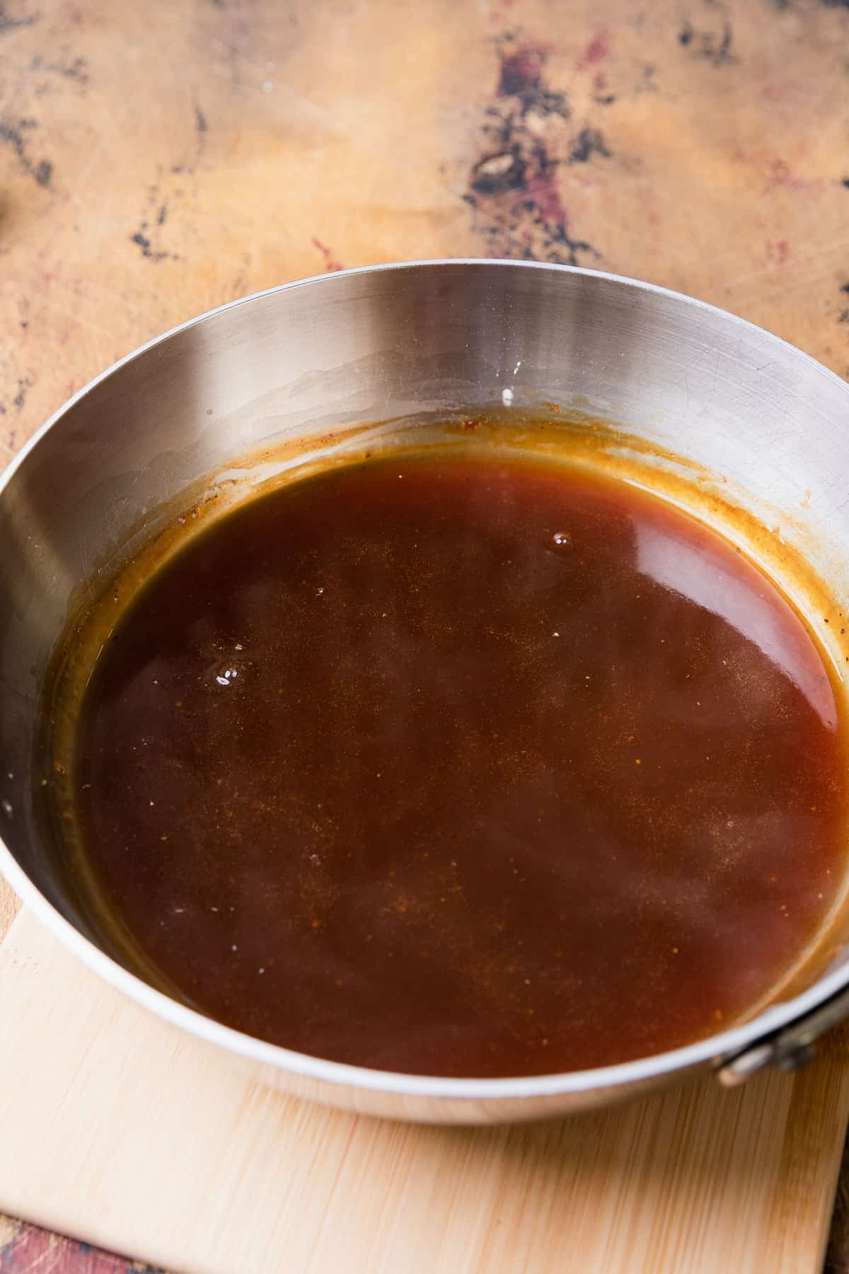 making gravy as it becomes thicker
