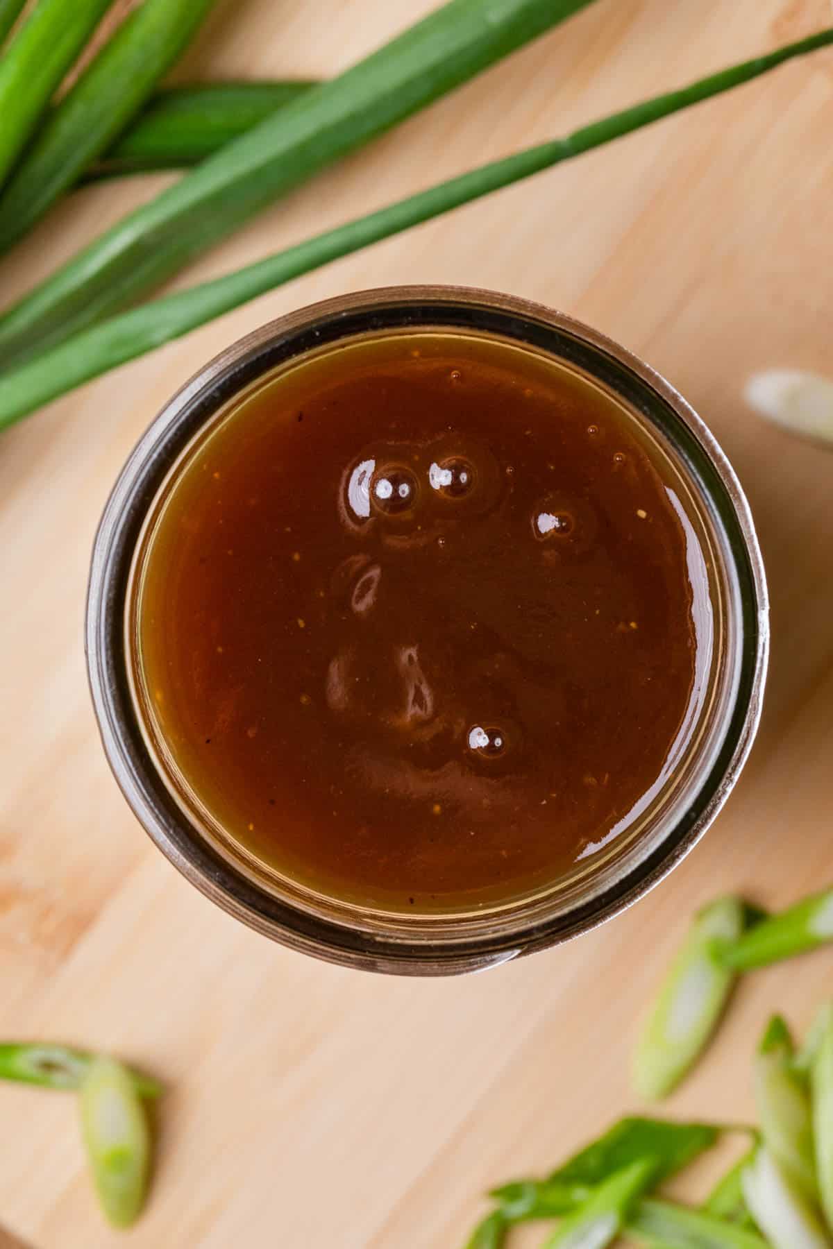 brown gravy stored in a mason jar