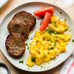 air fryer breakfast sausage patties with eggs and tomatoes