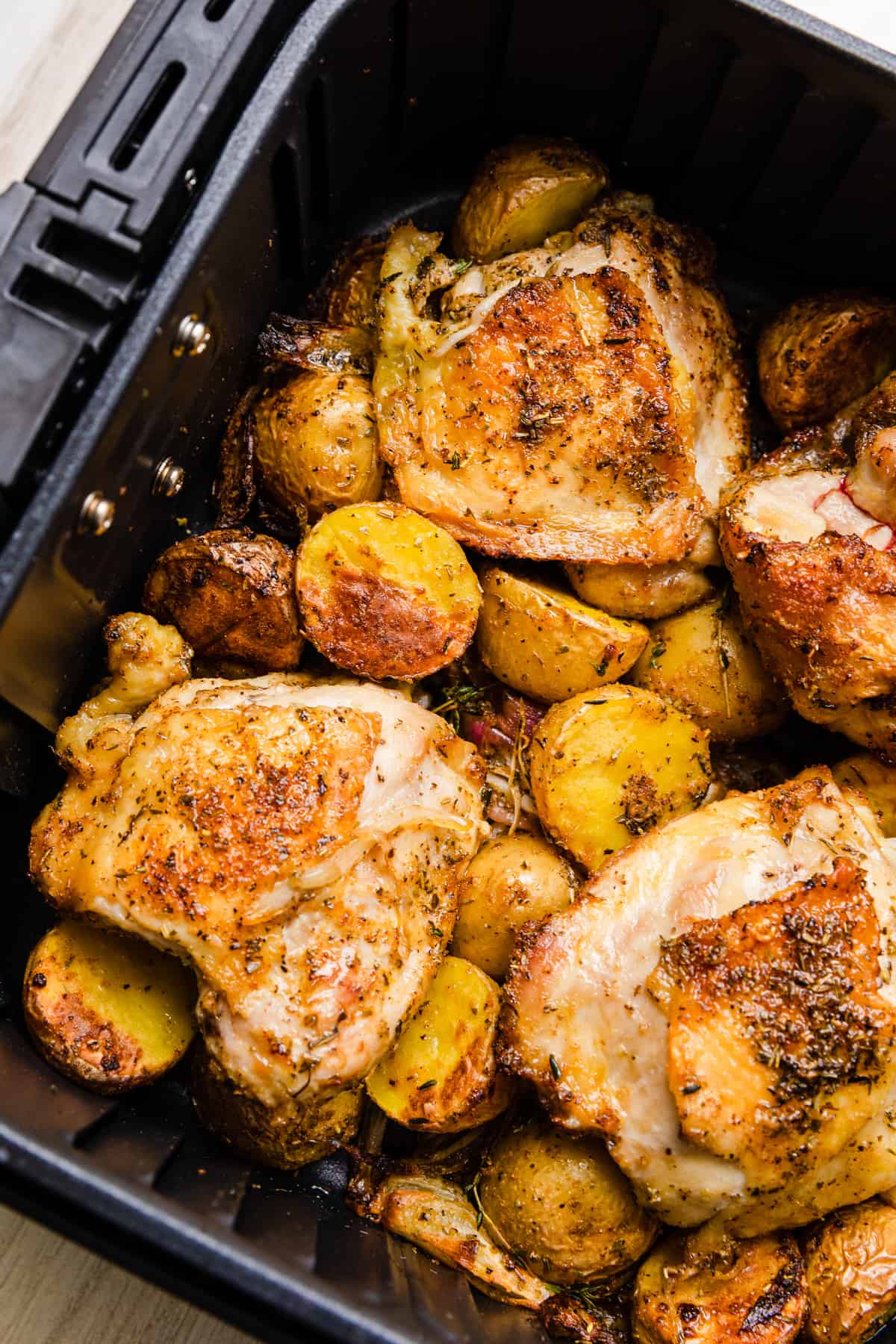 The completed recipe in the air fryer basket.