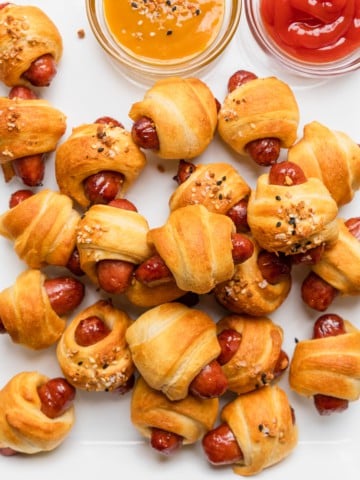 The completed recipe of pigs and a blanket made in an air fryer.