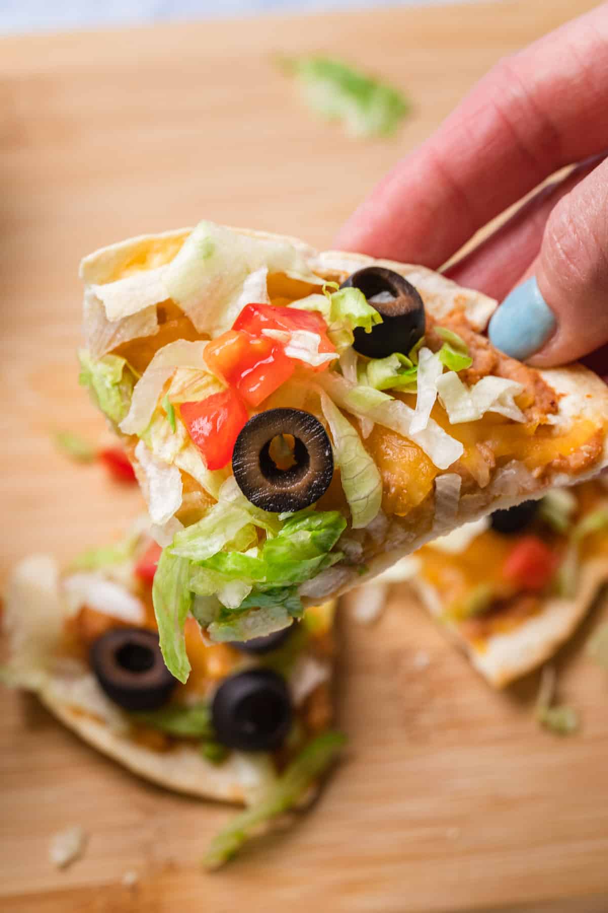 a tostada cut into a triangle