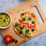 the completed air fried tostadas with some garnishes