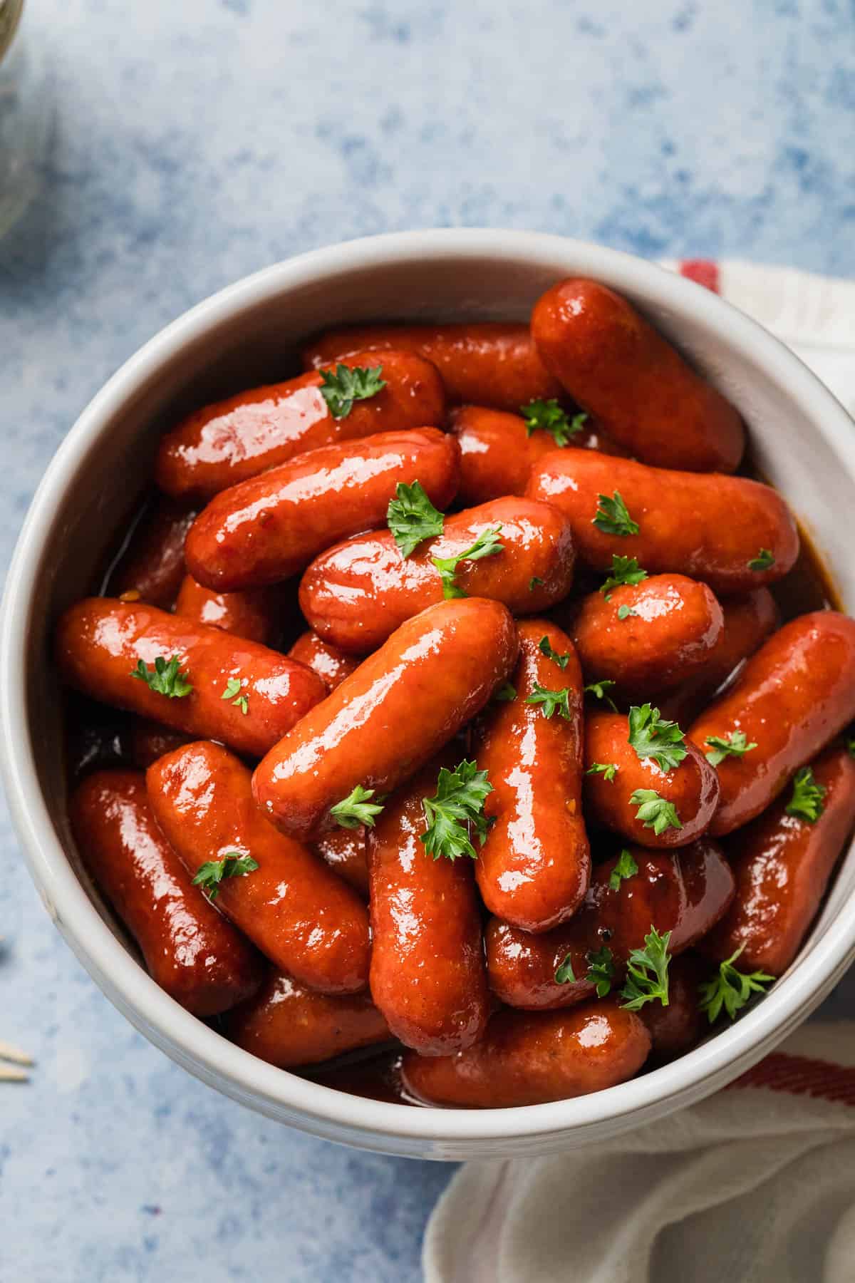 the completed crockpot lil smokies in a serving bowl