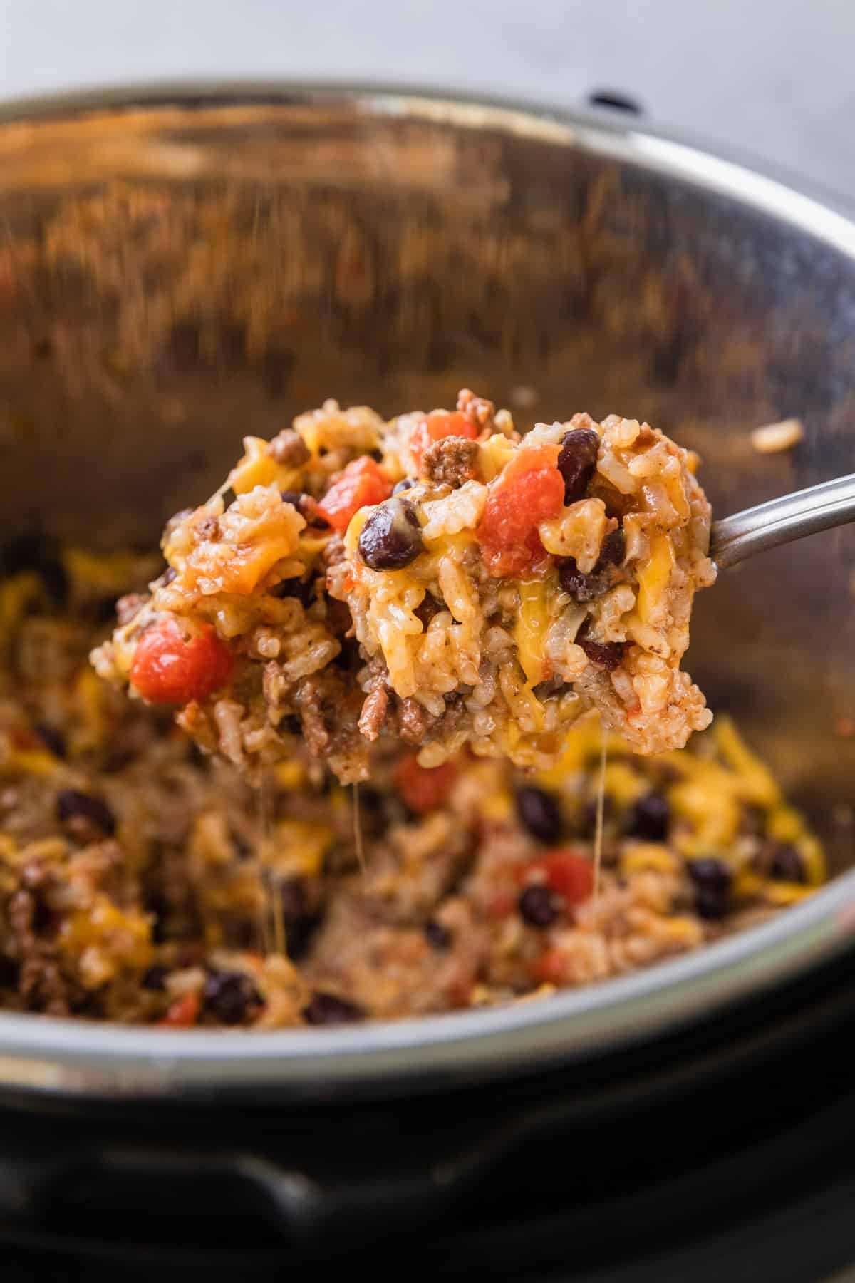 the completed instant pot ground beef and rice being served