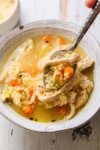 a bowl of chicken pastina soup