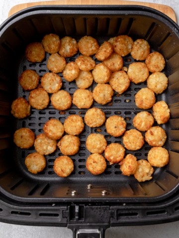 air fryer tater crowns completed in the basket