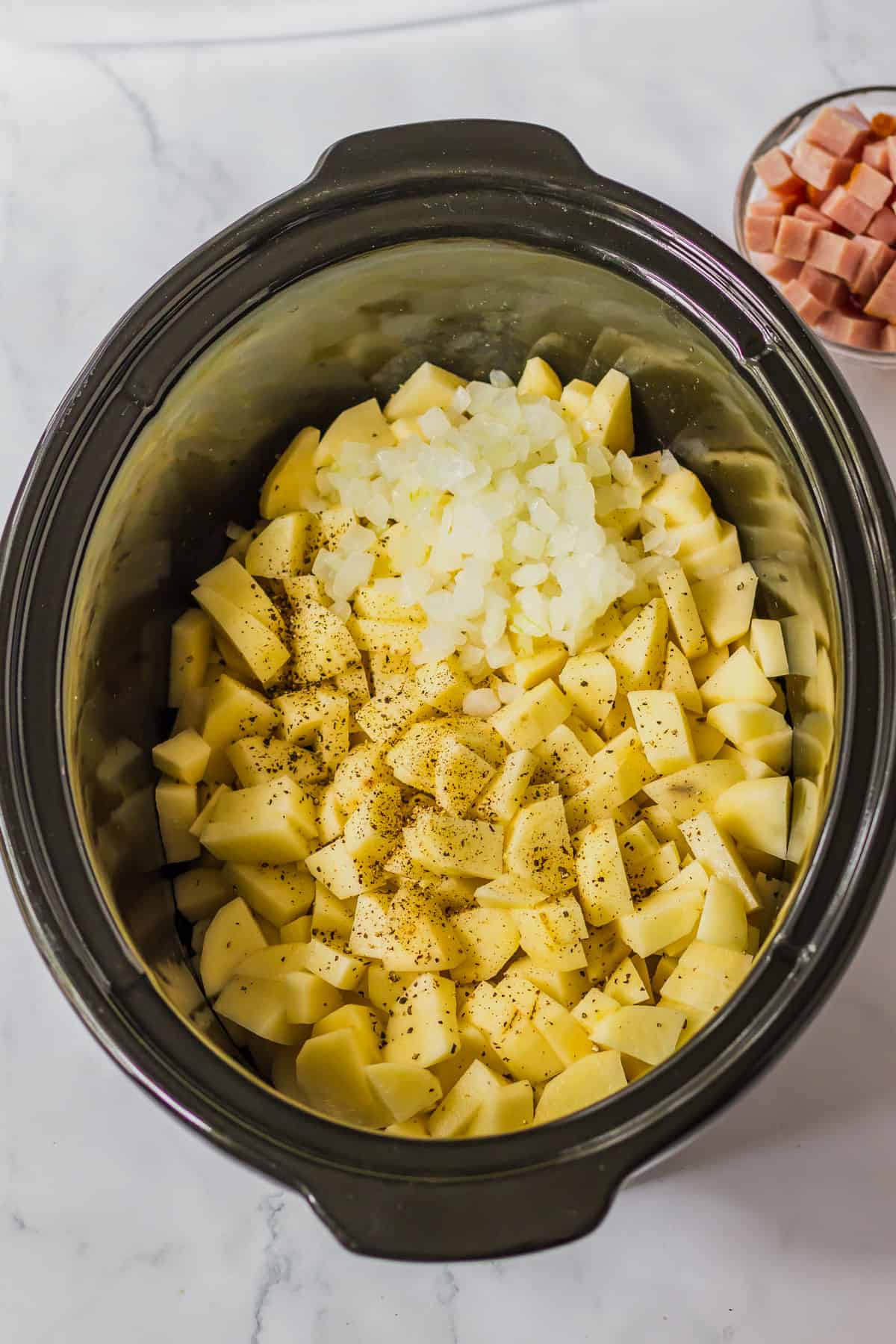 making a potato soup in the crockpot.