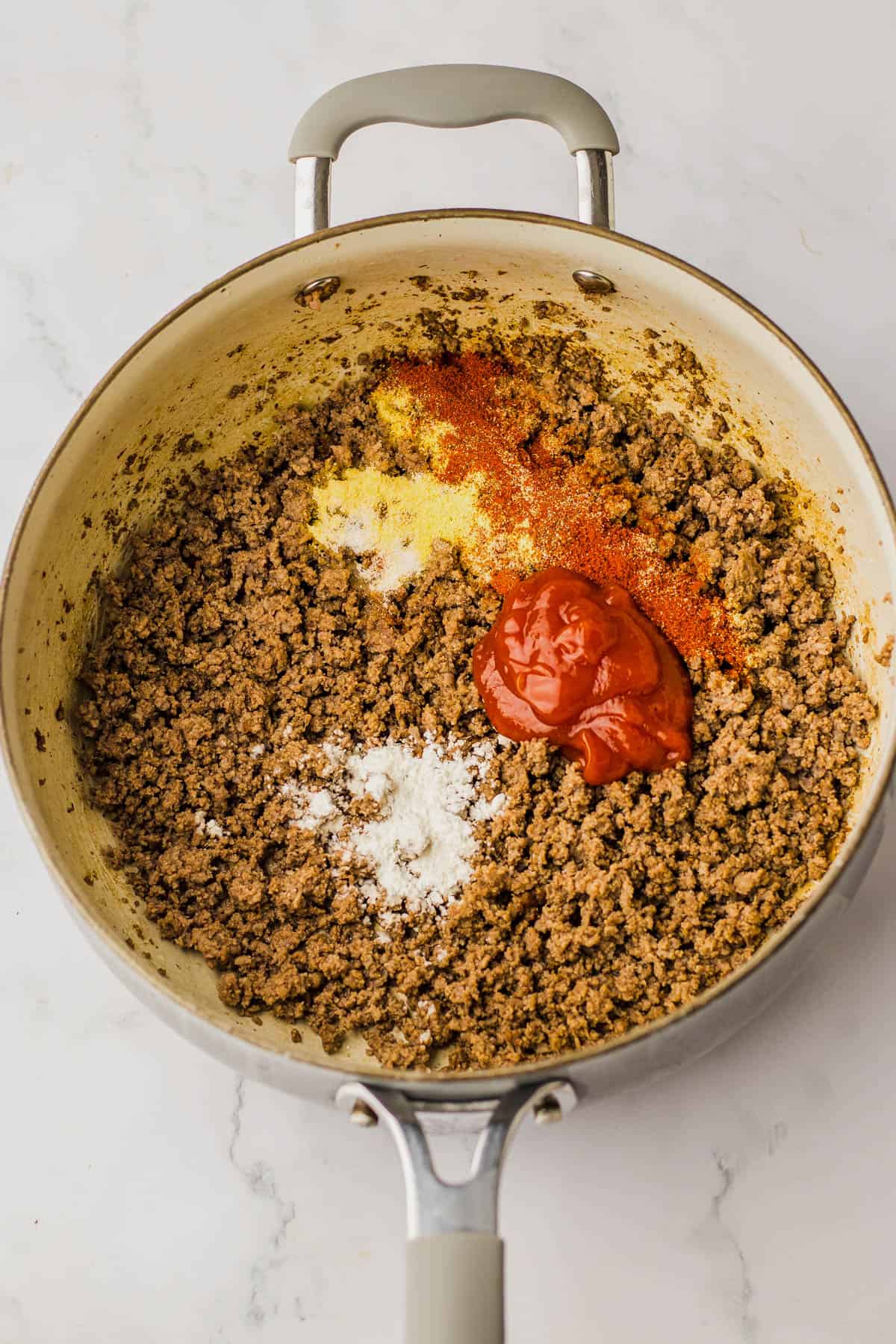 cooking the recipe with ground beef