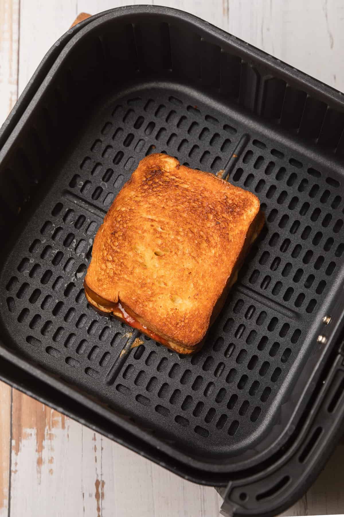 Both sides of the pbj cooked in the air fryer.