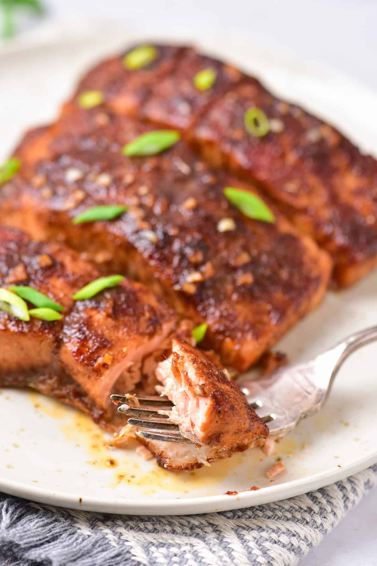 The completed salmon recipe on a plate.