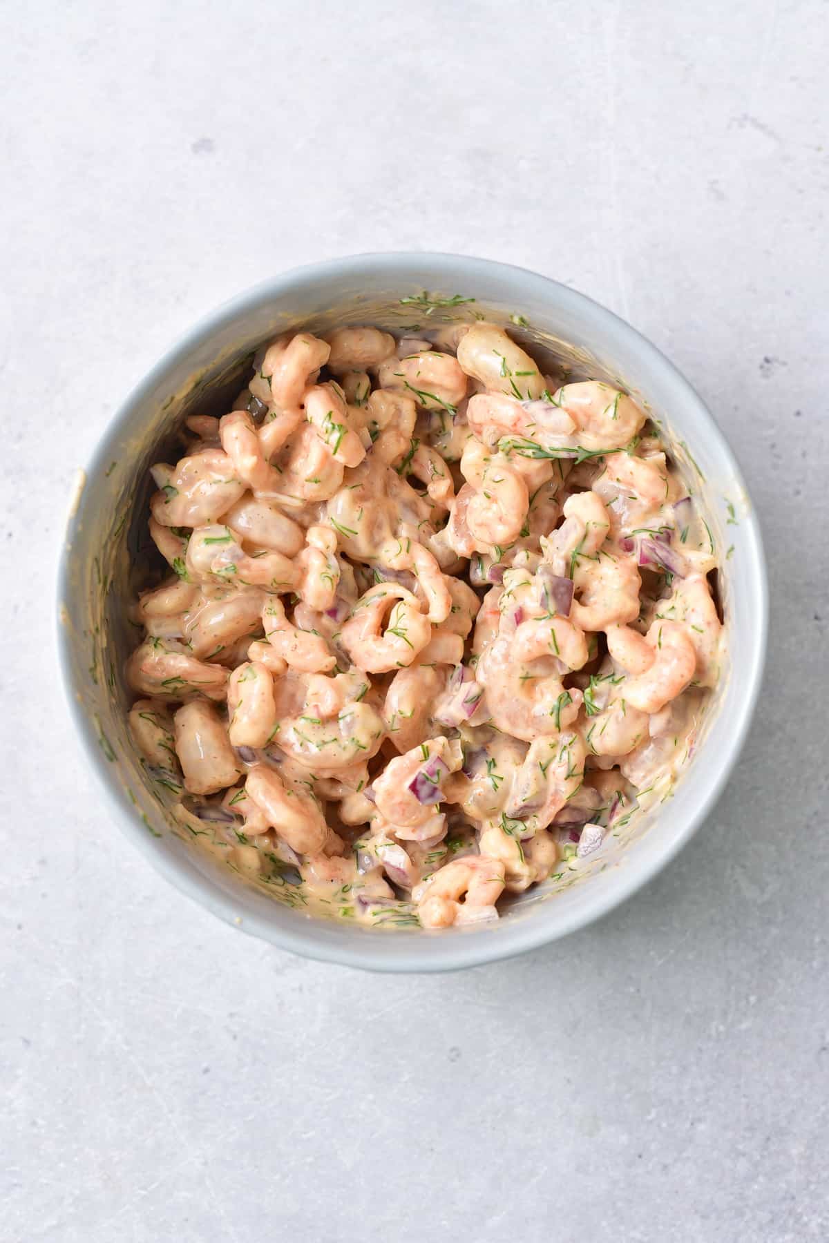 The shrimp salad mixed in a bowl.