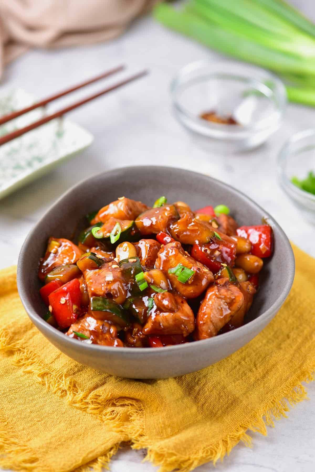 The completed kung pao chicken in a bowl.