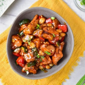 Panda express kung pao chicken recipe completed and placed in a gray bowl.