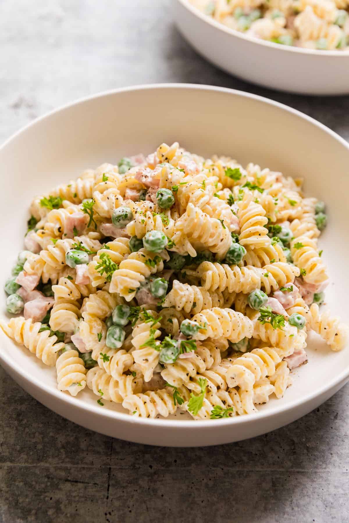 The completed ham and peas salad in a bowl.