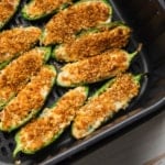 Air Fryer Jalapenos in air fryer basket.