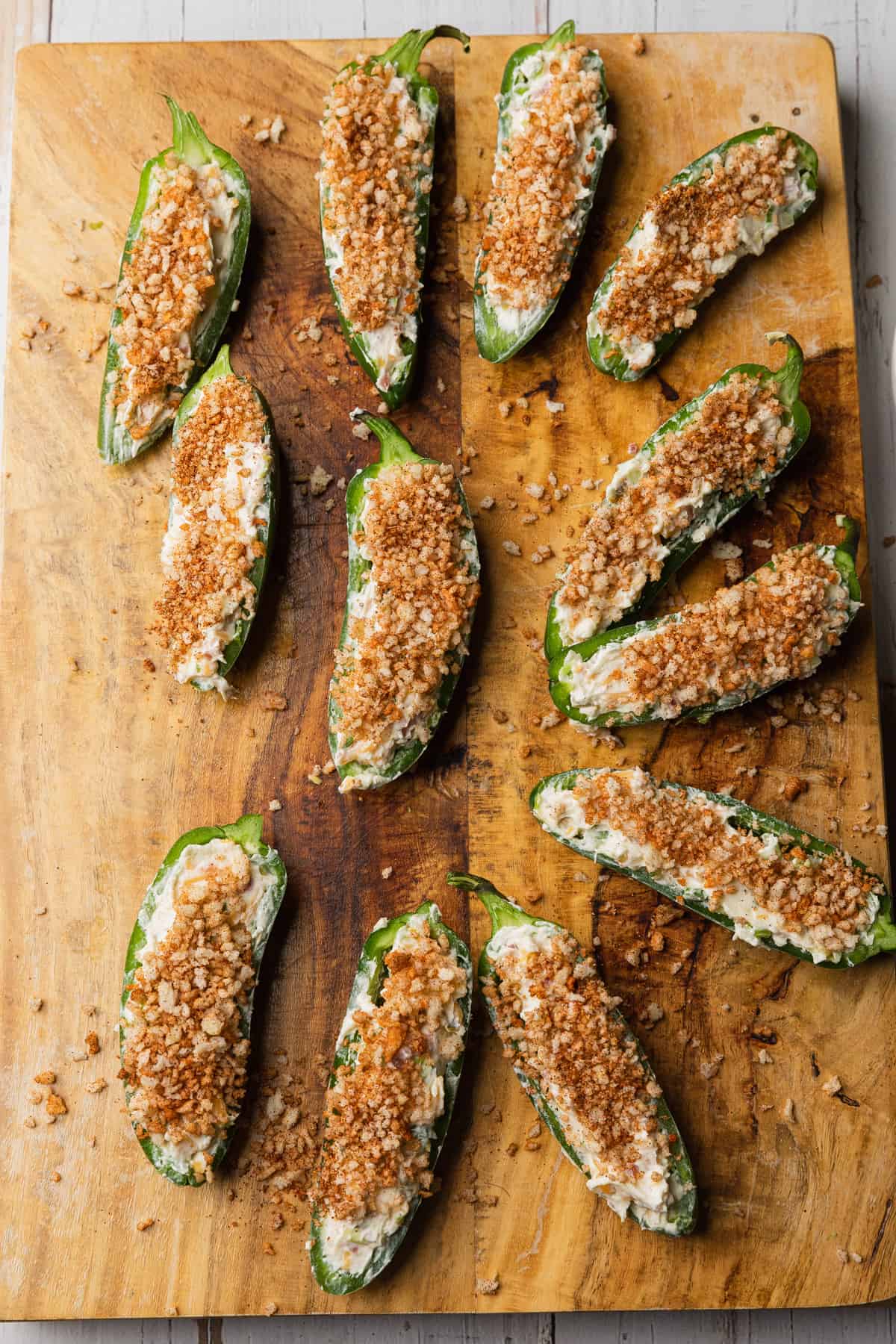 Add panko to the stuffed jalapenos.