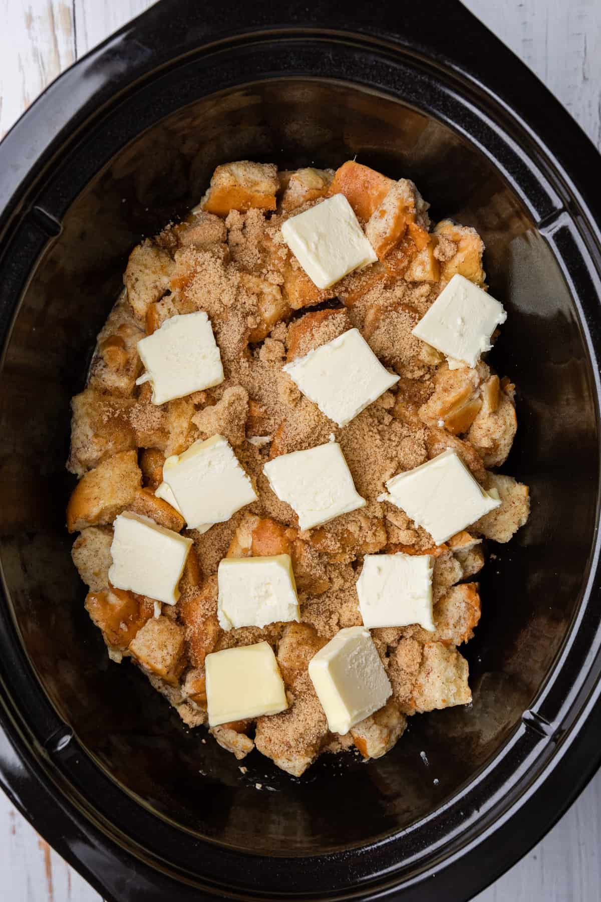 Making the casserole in the crockpot.