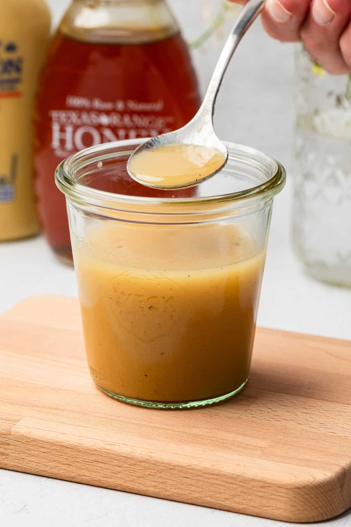 Honey mustard dressing in a jar.