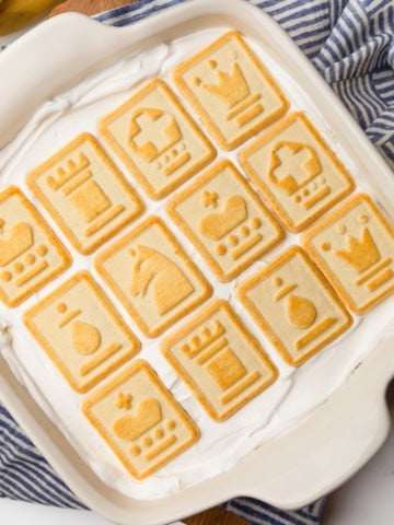 Banana pudding with chessman butter cookies on top.