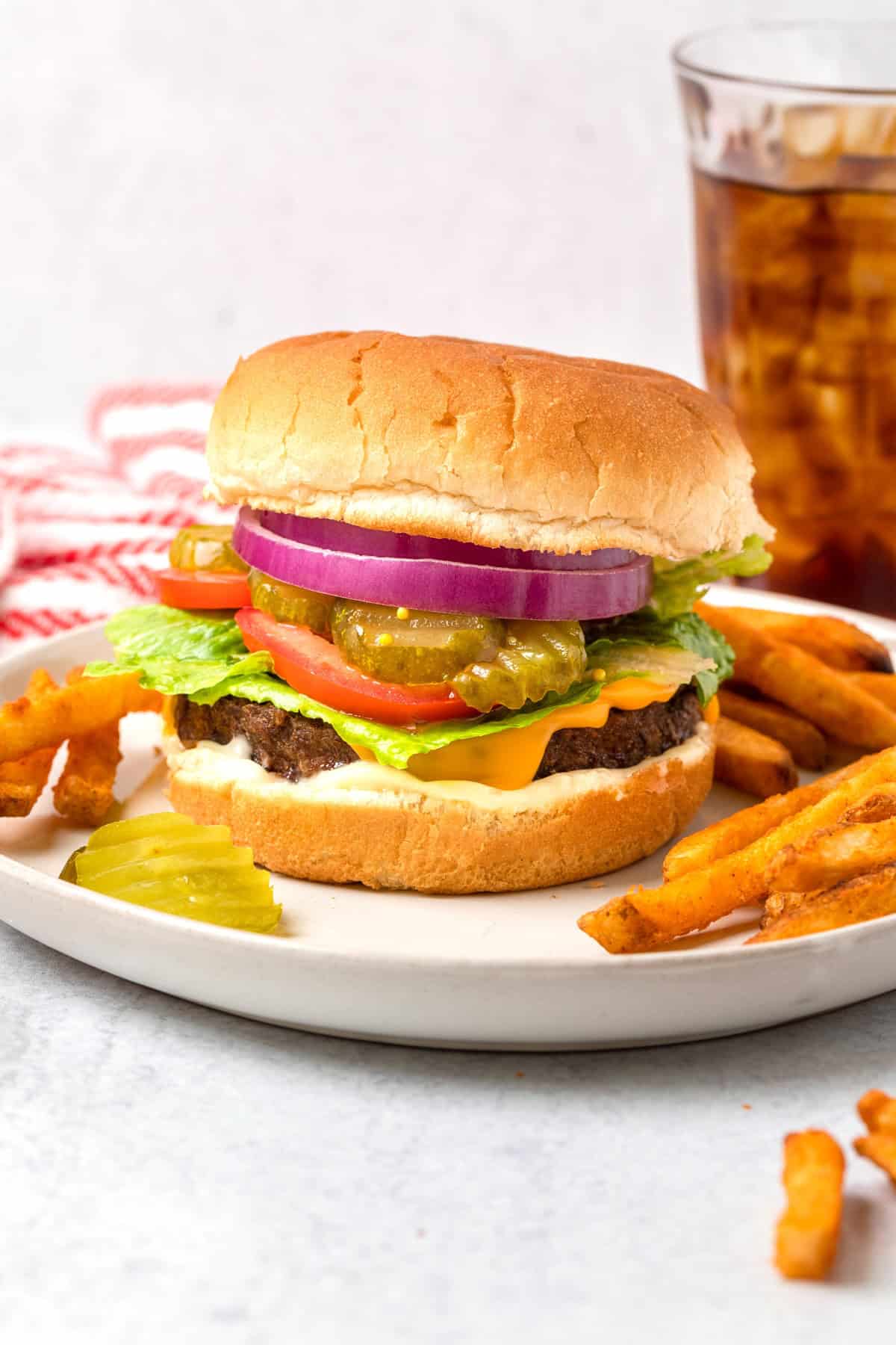 Air fryer frozen cheeseburger plated.