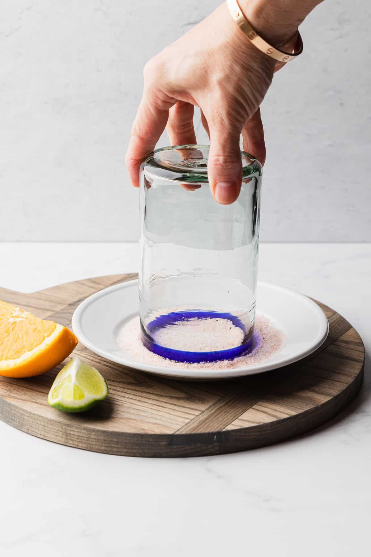 Salting the rim of a margarita glass.