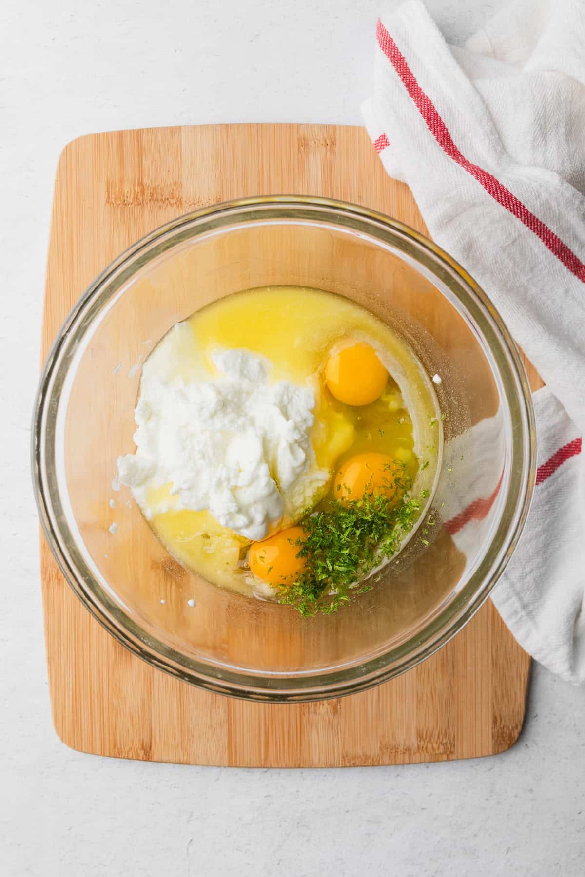 Mixing wet ingredients to make cake.